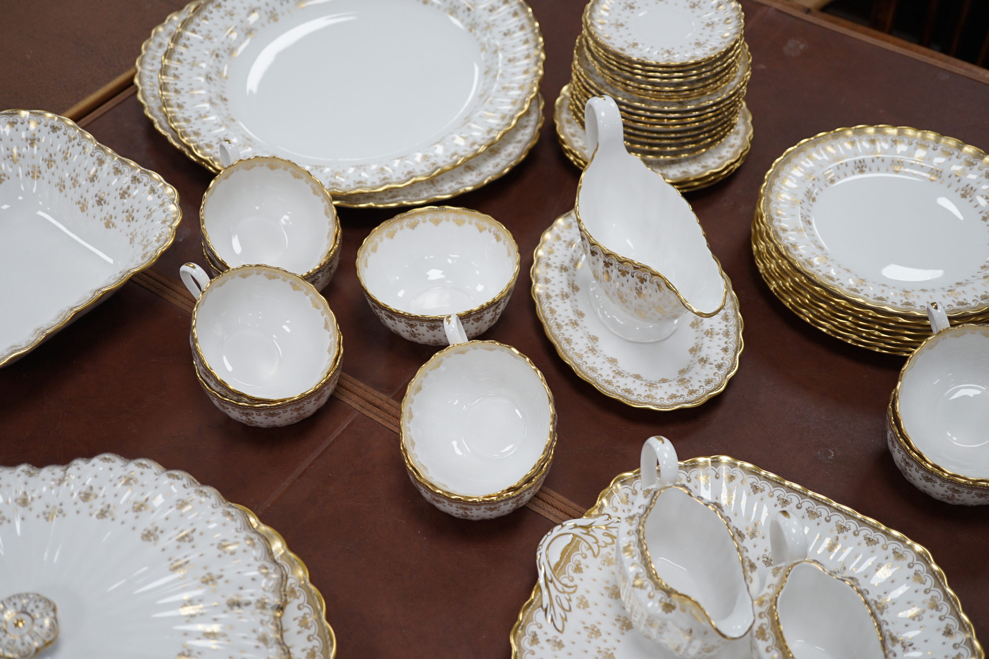 A Spode ‘Fleur de Lys’ dinner, tea and coffee set, settings for eight